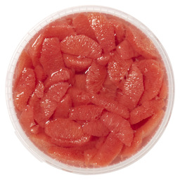 Grapefruit segmenten ontvliest in opgiet