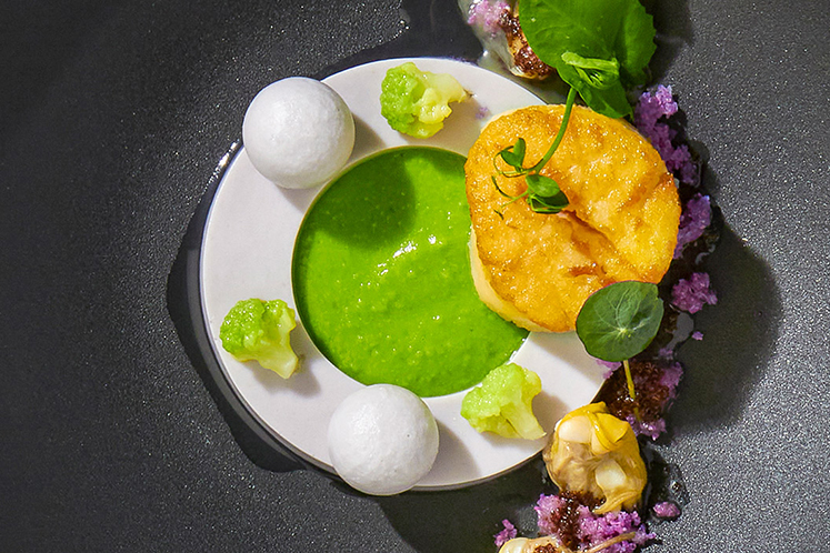 Coquilles, amandes, beurre noisette met een crème van paarse bloemkool