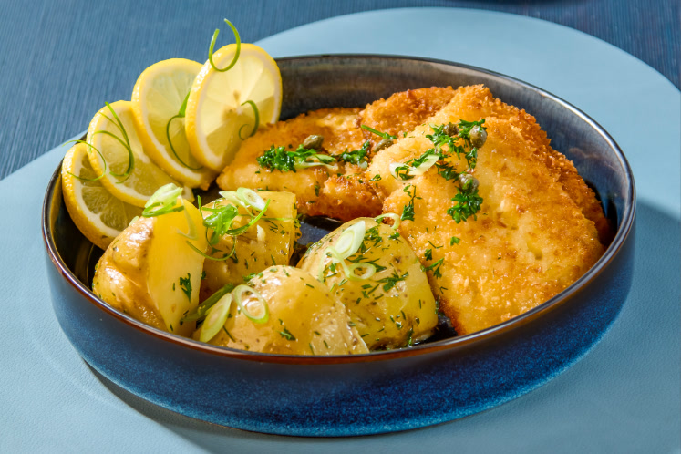 Krokante schelvis met aardappelen en frisse botersaus