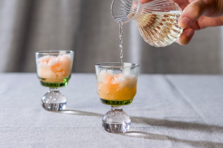 Shaved ice van Aperol met Aperolsiroop en prosecco