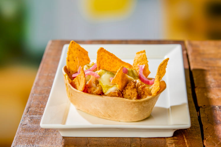 Sticky honey-lime chicken tortillaboat