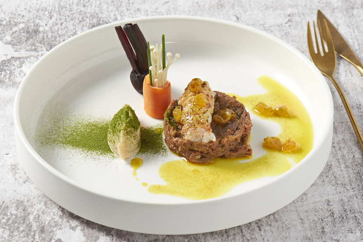 Sous-vide bereide kalfswang met gebakken langoustine