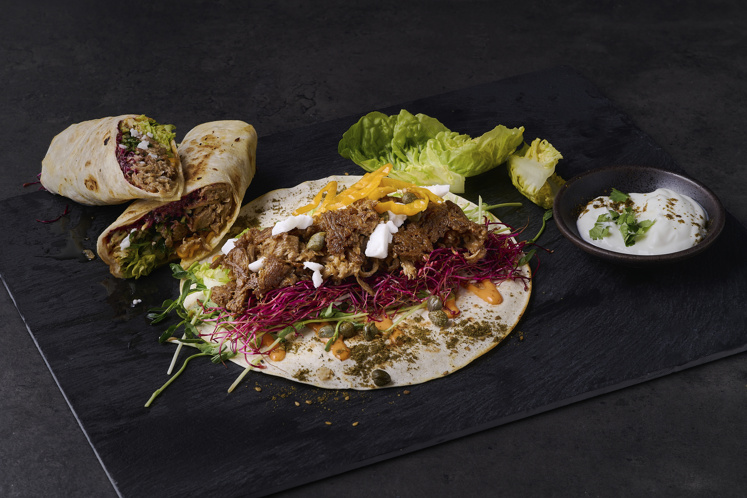 Redefine Meat pulled pork of beef in a wrap with your delights!